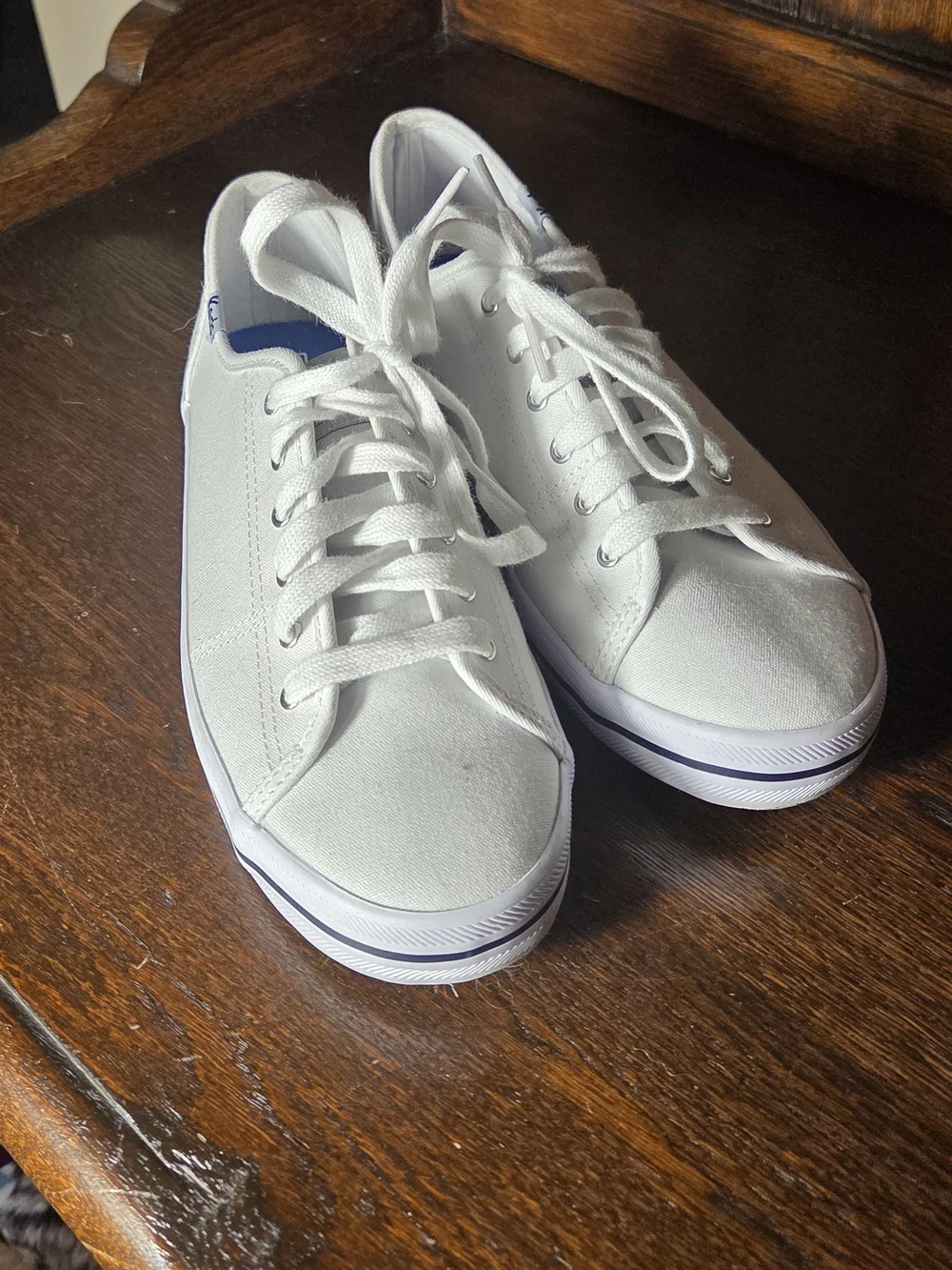 Keds Women's White Kickstart Canvas Low-Top Sneakers with Subtle Blue Trim.